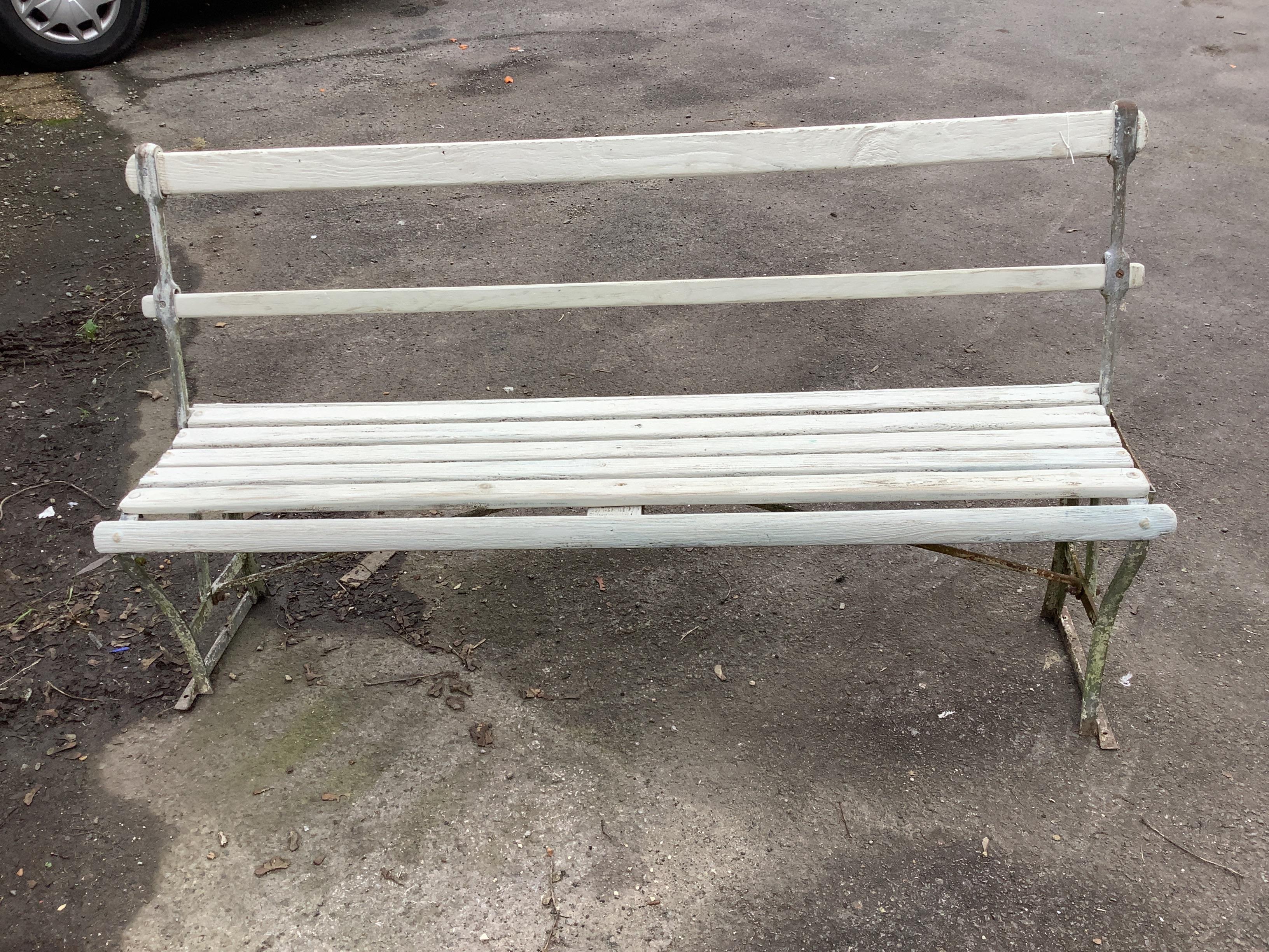 A reversible slatted wood bench, width 145cm, height 80cm